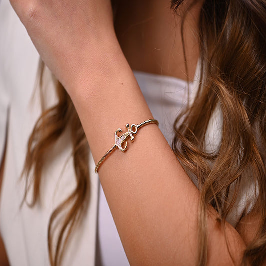 أسورة المغامرات ذهب عيار 18 بتصميم رمز أنيق