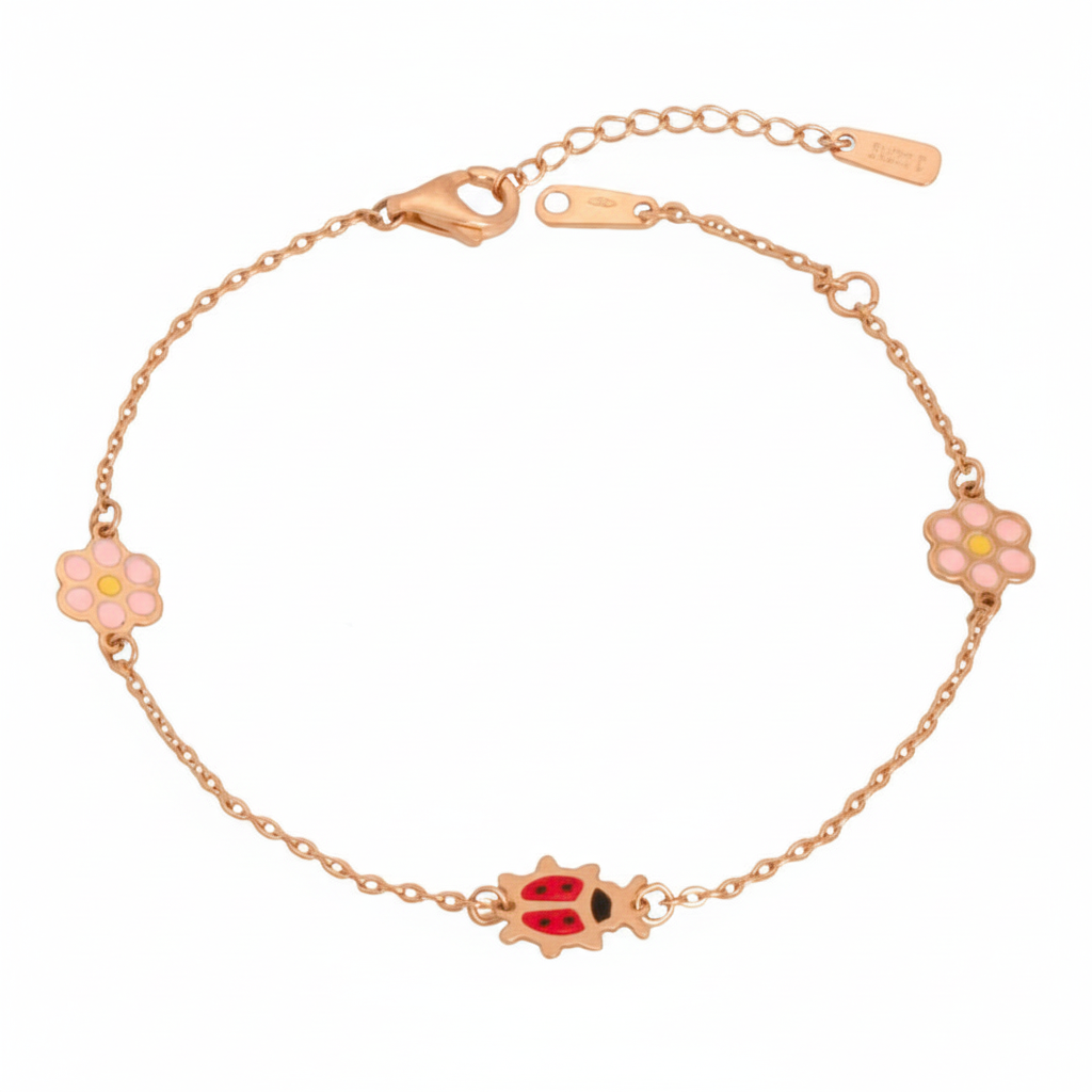 أنسيال ذهب عيار 18 بتعليقات متعددة من غمية، يظهر تصميمه الأنيق وتفاصيله الفريدة.