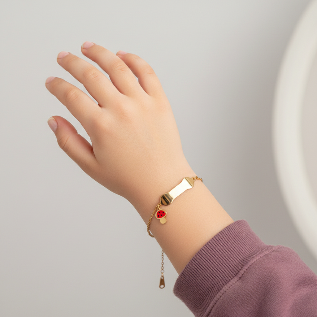 أنسيال ذهب عيار 18 من غاميه مزين بلوحة وفطر ملون، تصميم أنيق يناسب جميع المناسبات.