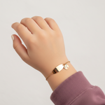 Gold panda-shaped bracelet for kids by Ghamieh, featuring a cute and playful design.