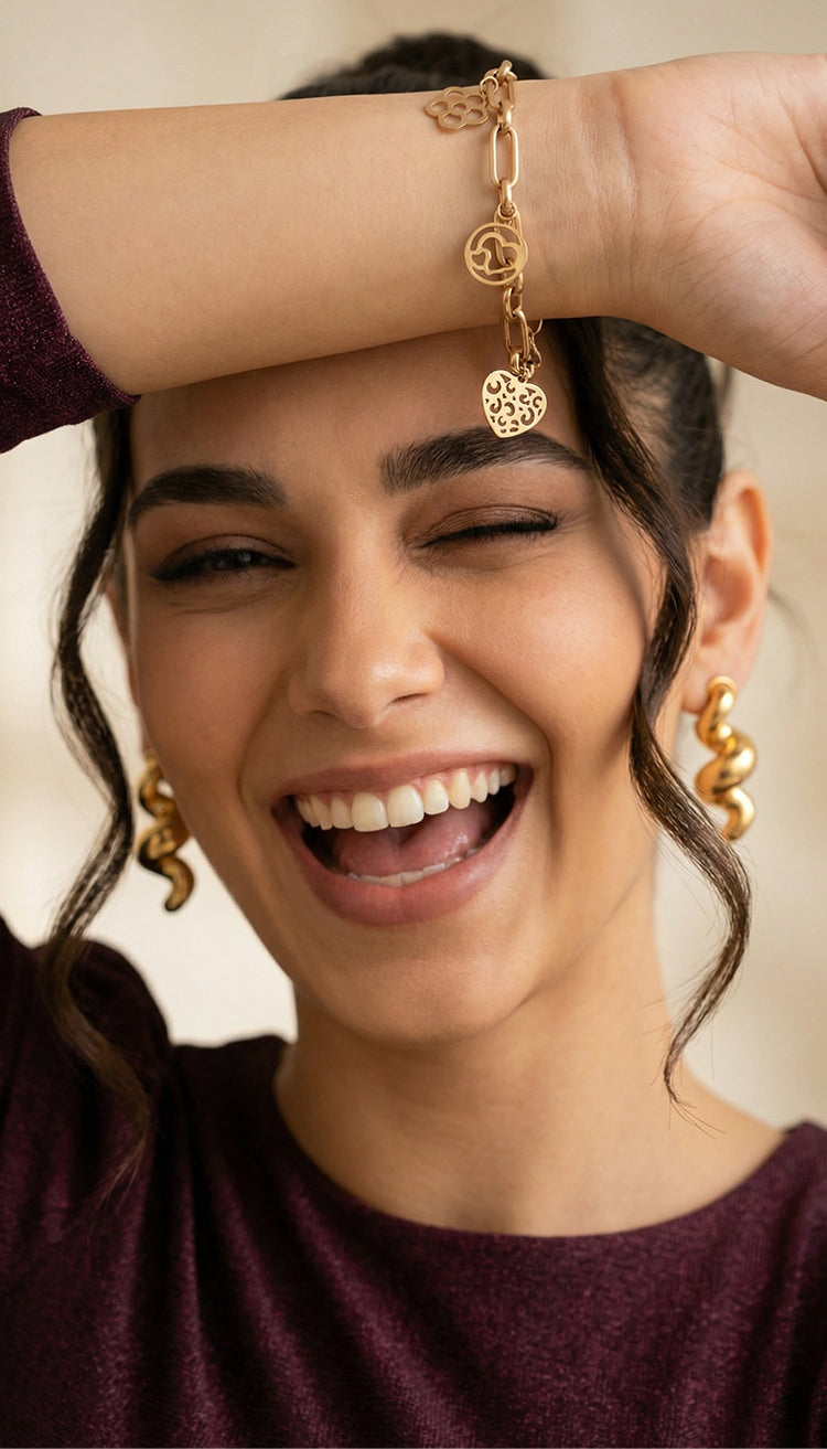 أقراط ذهب عيار 18 بتصميم ملتوي