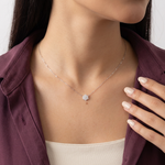 18K gold necklace with a flower pendant by Ghamieh, showcasing elegant design and craftsmanship.