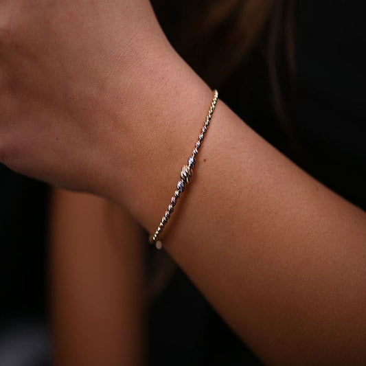 أسورة ذهب عيار 18 بتصميم مجدول