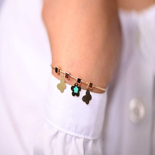 أسورة ذهب اطفال بتصميم ورود