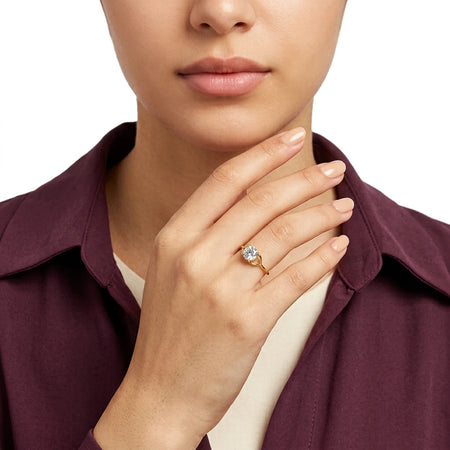 18K Gold Ring with Small Sparkling Stone Design