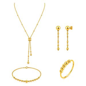 18K Gold Set with Flowing Balls Design