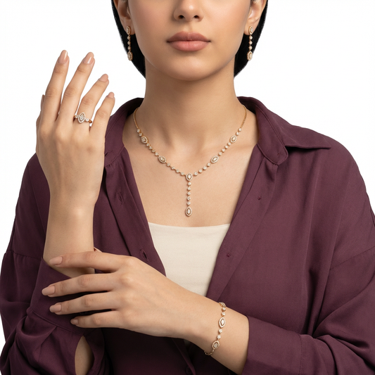 طقم إيلجر عيار 18 من غاميه، يتضمن مجوهرات أنيقة بتصميم مميز من الذهب.