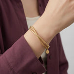 أسورة ذهب عيار 18 بتصميم مزدوج - Ghamieh