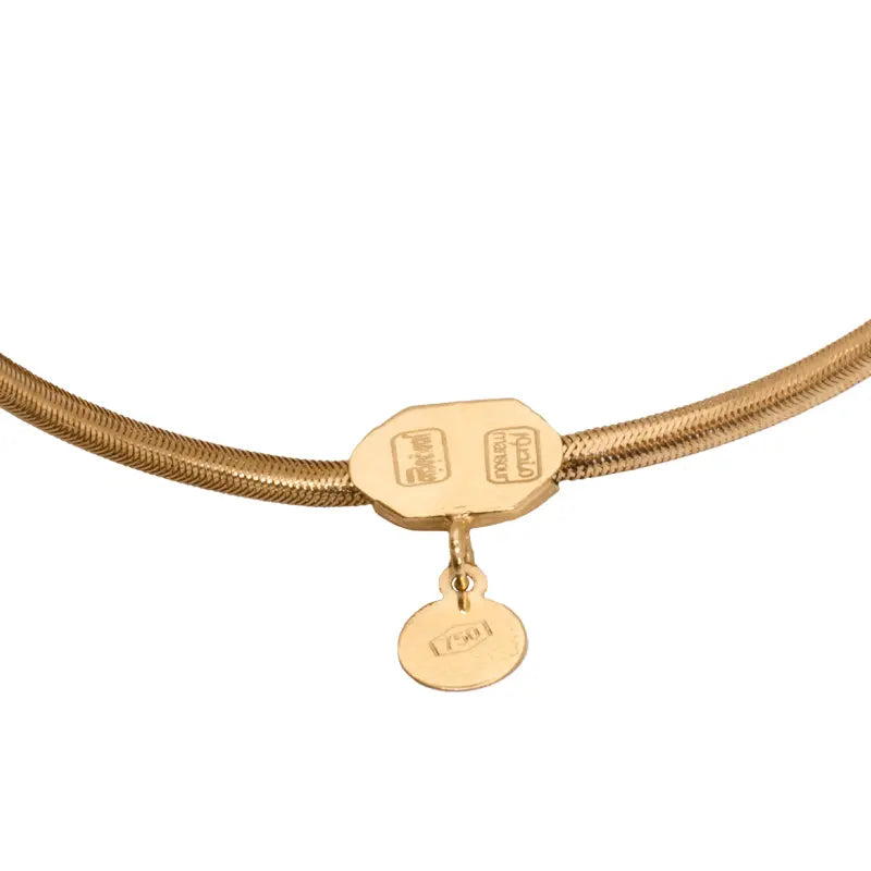 أسورة ذهب عيار 18 بتصميم ثعباني - Ghamieh