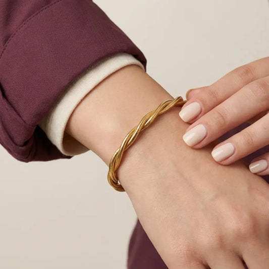 أسورة ذهب عيار 21 بتصميم مجدول - Ghamieh