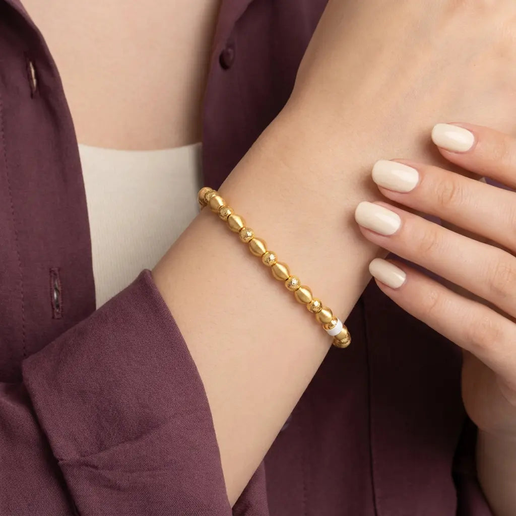 أسورة ذهب عيار 21 بحبات ذهبية - Ghamieh