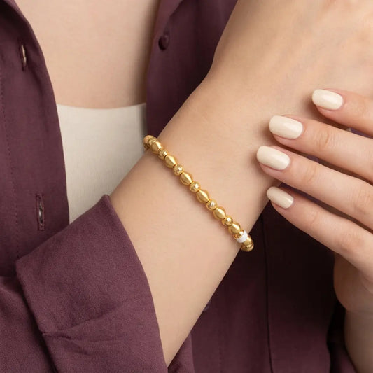 أسورة ذهب عيار 21 بحبات ذهبية - Ghamieh