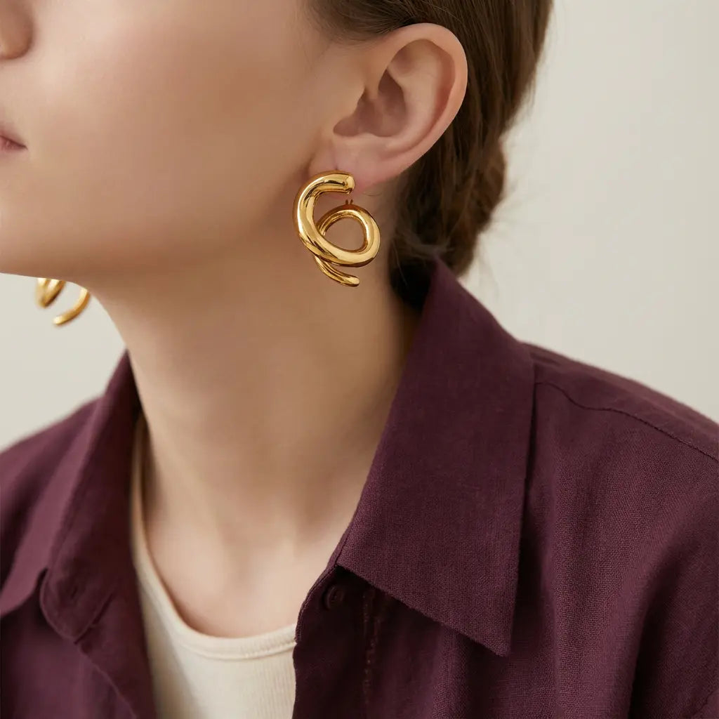 أقراط ذهب عيار 18 بتصميم حلزوني - Ghamieh