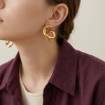 أقراط ذهب عيار 18 بتصميم حلزوني - Ghamieh