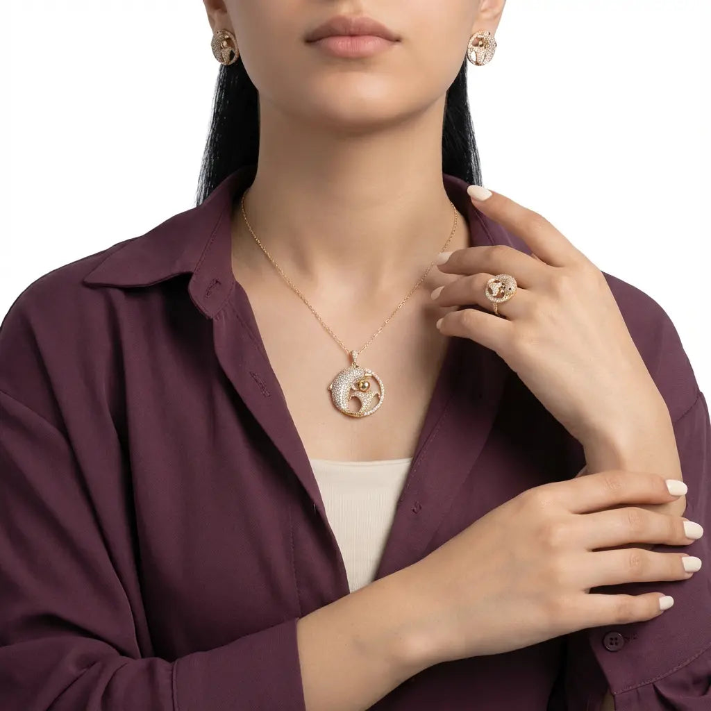 طقم الحياة  ذهب عيار 18 وبتصميم دولفين - Ghamieh