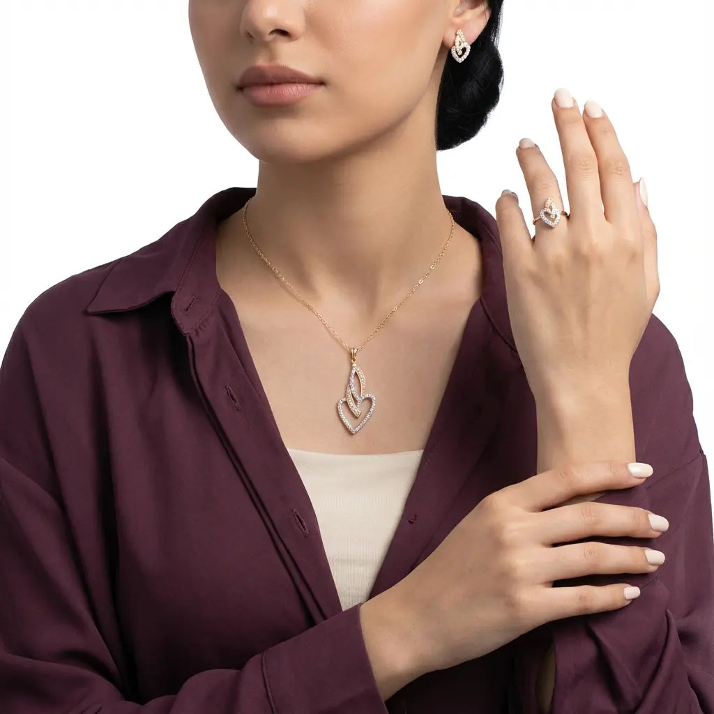 طقم الحب من الذهب عيار 18 بفصوص لامعة - Ghamieh