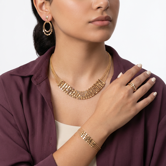 طقم ذهب عيار 18 بتصميم شبكي فخم - Ghamieh