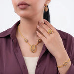 طقم ذهب عيار 21 مرصع بالفصوص الكحلي - Ghamieh