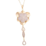 تعليقة زهرة ذهب أنيقة عيار 18 بفصوص لامعة - Ghamieh