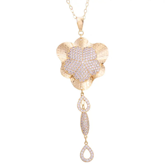 تعليقة زهرة ذهب أنيقة عيار 18 بفصوص لامعة - Ghamieh