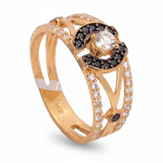 خاتم ذهب عيار 18 مرصع بحجر داكن بيضاوي بتصميم أنيق من غاميه Online.