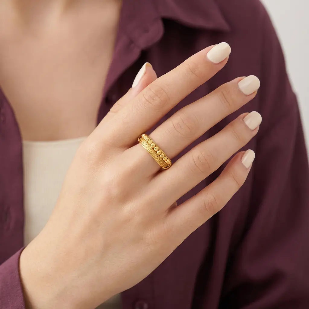 خاتم عيار 21 بتصميم كرات ذهبية - Ghamieh