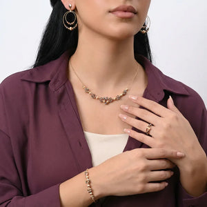 طقم ذهب عيار 18 بتصميم زهري راقٍ - Ghamieh