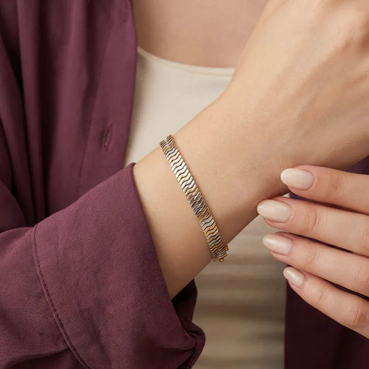 أنسيال ذهب عيار 18 بتصميم مجدول