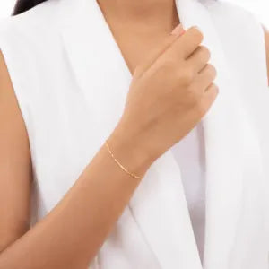 Classic 21K gold bracelet by Ghamieh, showcasing an elegant design with a polished finish and intricate details.