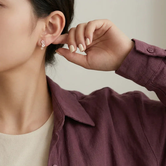 أقراط عيار 18 بتصميم زهور ملونه متدليه