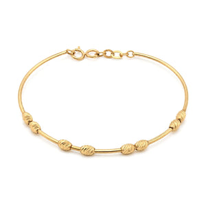 18K Gold Bracelet with Knot Row Design