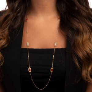 Gold shawl with red stone